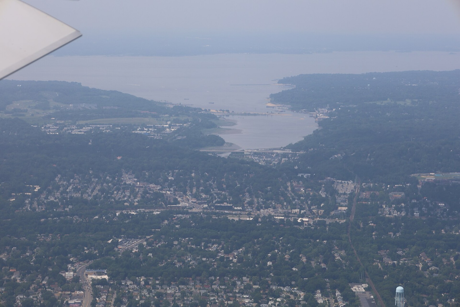 Aerial view of Hempstead Harbor's shoreline and water on Long Island's North Shore