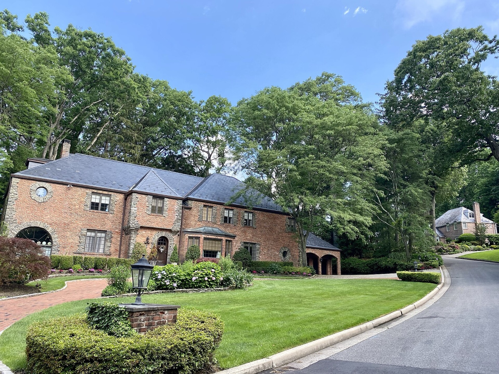 Residential street in Strathmore Village, Manhasset, on Long Island