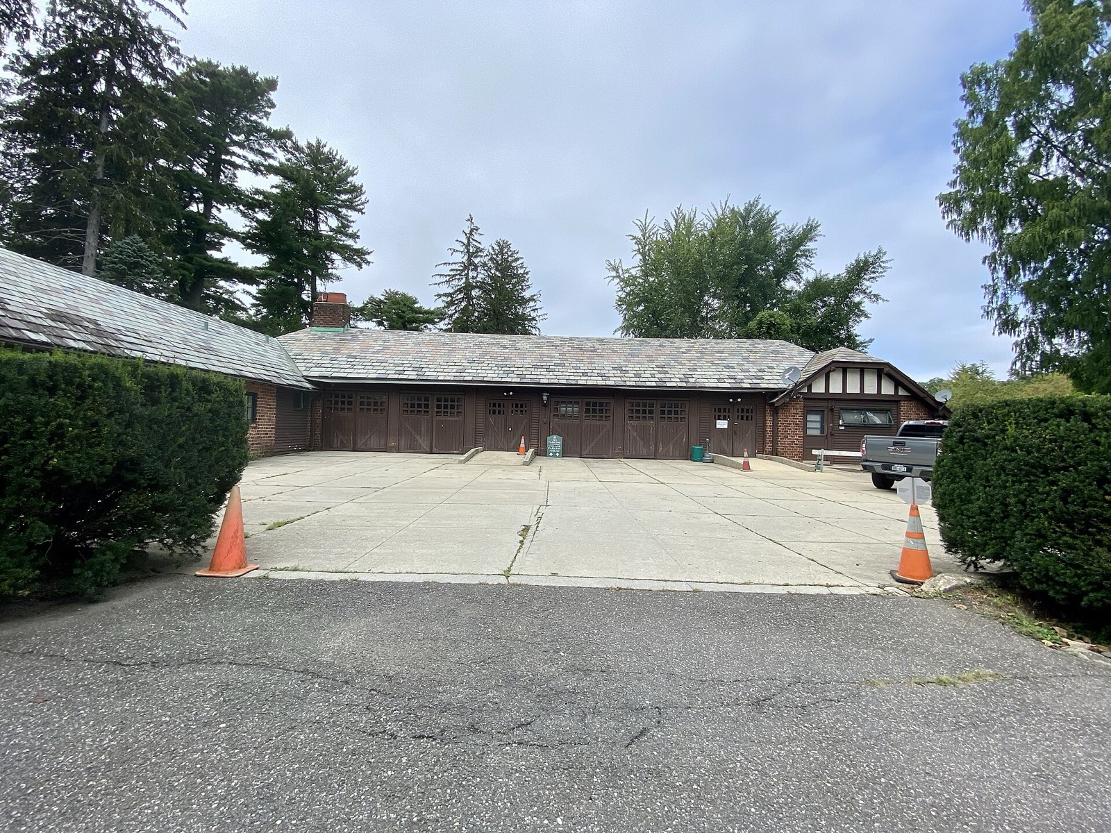 Upper Brookville Village Hall, the historic carriage house at Planting Fields Arboretum